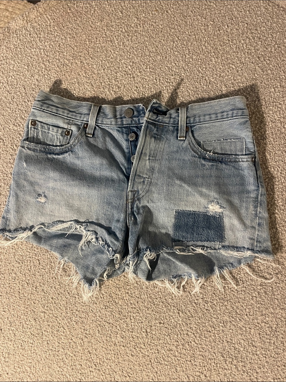 Levis Women's Light Blue Distressed Denim Cutoff Shorts